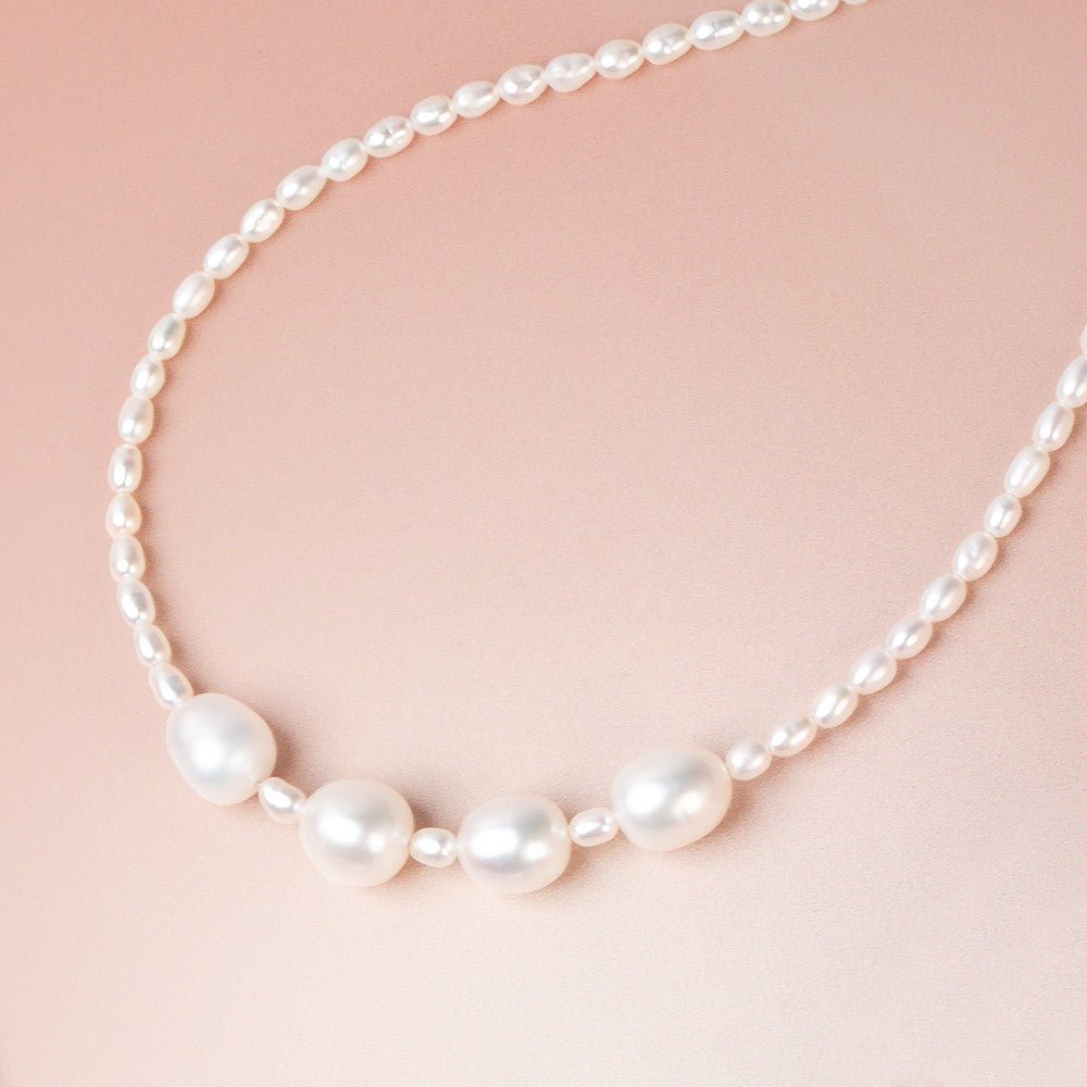 9.5-10mm Off White Oval Freshwater Pearl Set of 4 Beads