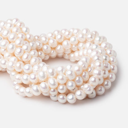 9.5x9-11x10mm Creamy White Off Round Freshwater Pearls 16 inch 42 Beads