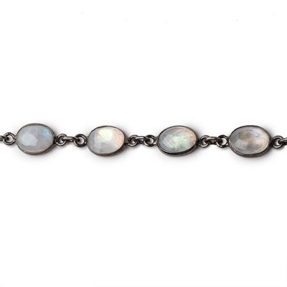 9x7mm Rainbow Moonstone Faceted Oval Cabochon Black Gold .925 Bezeled Chain