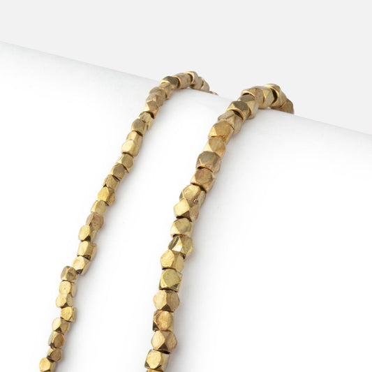 Hand Polished Yellow Brass Faceted Nugget Beads on an 8 inch Strand